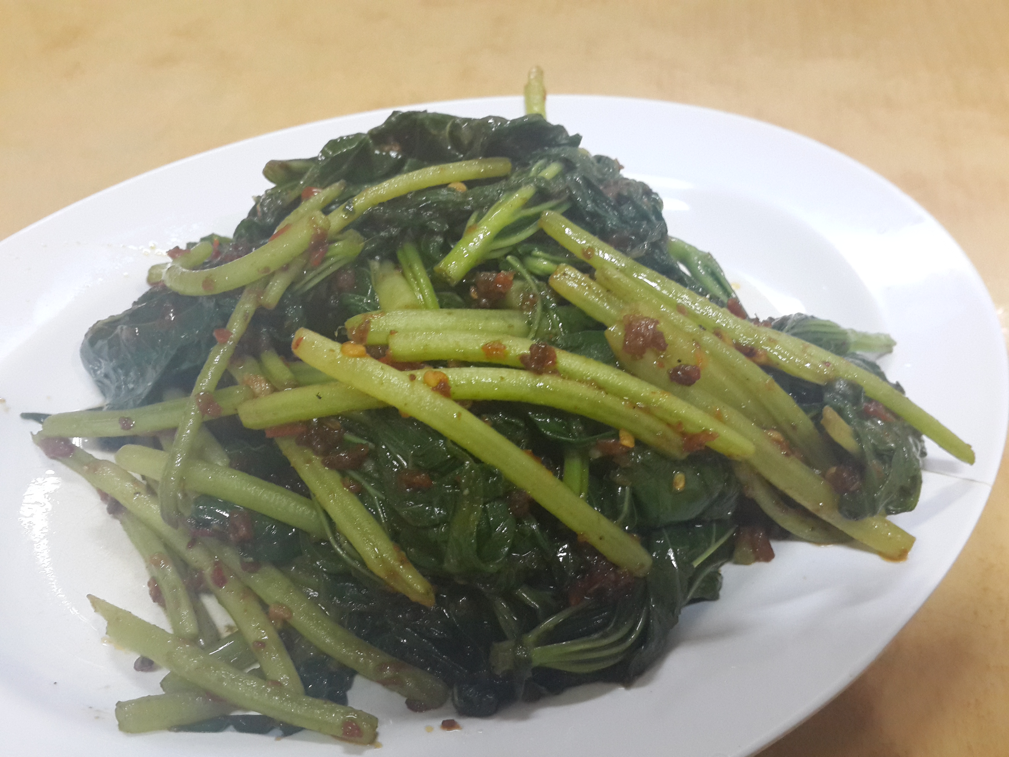 Sweet Potato Leaves - cooked in spicy sauce. One of the rare places who serve this dish and cook it crunchily well!