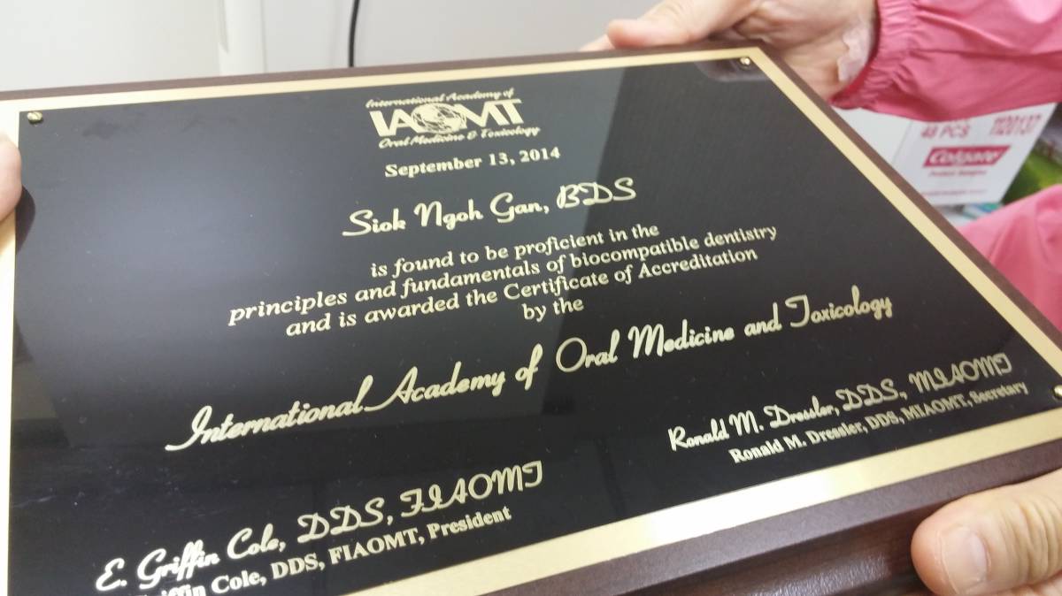 Dr Gan Siok Ngoh's official certification from International Academy of Oral Medicine and Toxicology